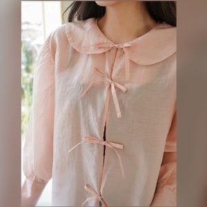 Solid lace up bishop sleeve top